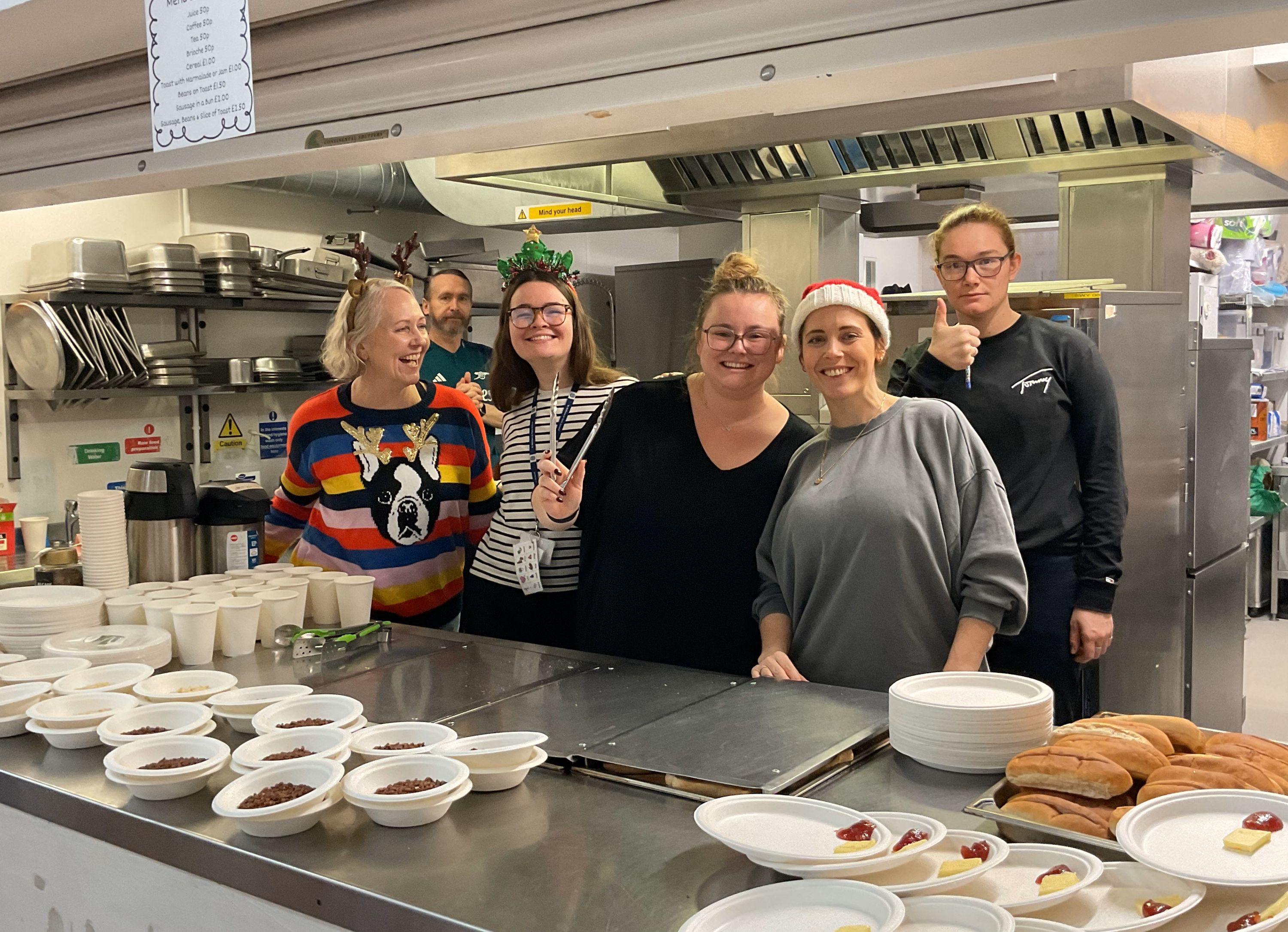 Photo of staff serving festive food